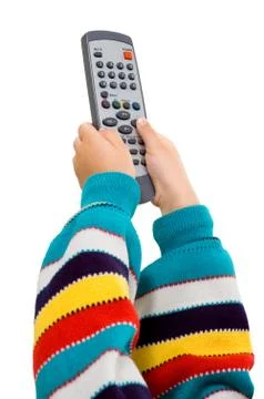 Children's hands with a remote control Stock Photos