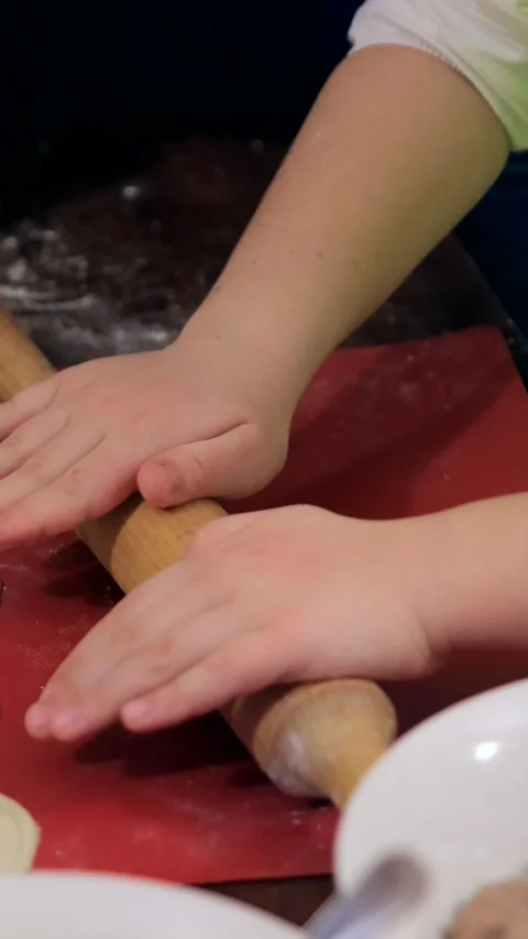 Children's hands show cooked ravioli Stock Footage 304160835