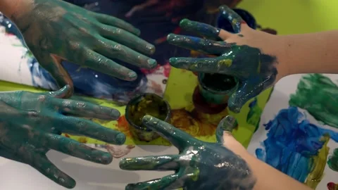 Children's hands smeared with paint, close-up. Child development concept. Stock Footage 167966081
