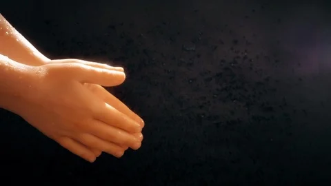 Children's hands under a stream of water. Solar spray. The child washes his Stock Footage 127208027