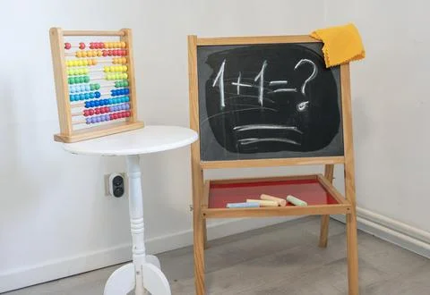 Children's learning tools, featuring a colorful abacus and a freestanding Stock Photos