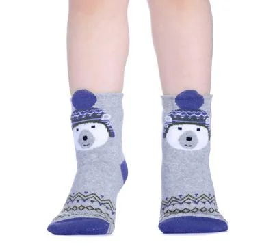 Children's legs in socks Stock Photos