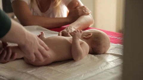 Children's massage at home Stock Footage 70176072