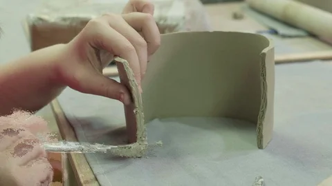 Children's master class in clay modeling. Ceramic workshop Stock Footage 128799592