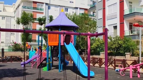 Children's  outdoor entertaining and developing complex with slides and swings Video stock 247545678
