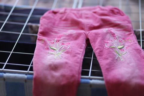 Children's pink pants with patterns Stock Photos