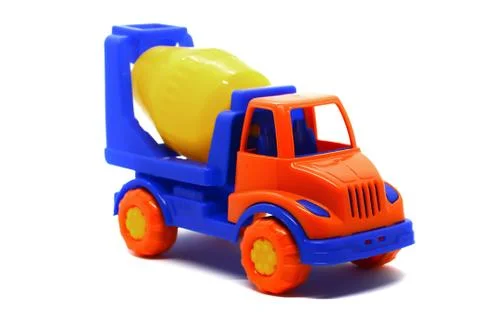 Children's plastic multi-colored toy concrete mixer on a white background. To Stock Photos