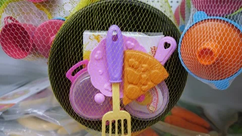 Children's plastic pan and plastic kitchen utensils in a toy store 스톡 동영상 262662798