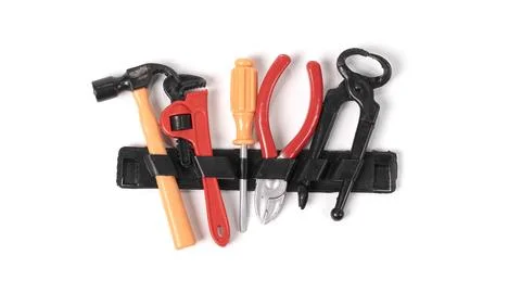 Children's plastic toy construction tools isolated on white background. Foto stock