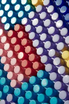 Children's play background: the plane of plastic multi-colored bricks, blur,  Stock Photos
