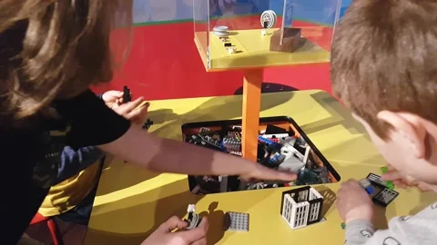 Childrens play with Lego Stock Footage 141507221