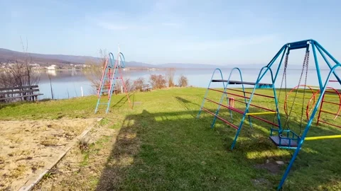 Children's playground on the beach of the lake Stock Footage 266794516
