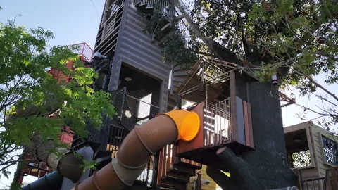Children's playground tall slides inside container park in las vegas Stock Footage 191128556