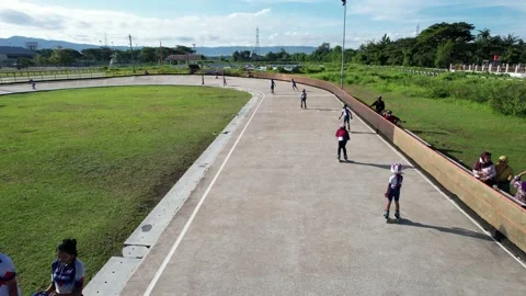 Childrens playing Roller skate circuit Stock Footage 167434800