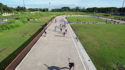 Childrens playing Roller skate circuit Stock Footage 167437378