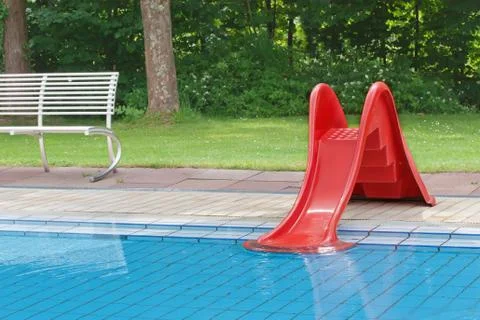 Children's pool with slide Stock Photos