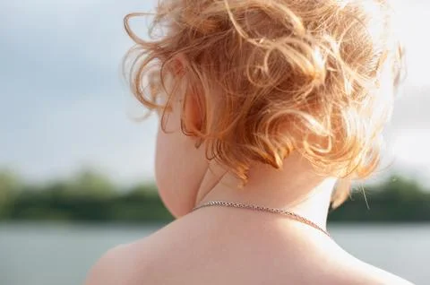 Children's red curls Stock Photos