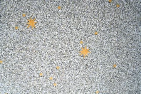 Children's room wallpaper texture with yellow stars. Stock Photos