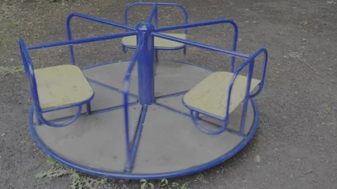 The children's round carousel spins quickly. Stock Footage 310514994