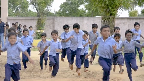 Children's running towards camera Stock Footage