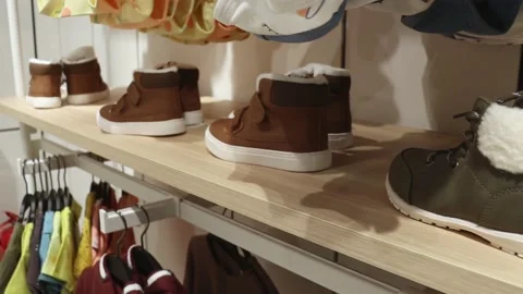 Children's shoes in the store. Stock Footage 203909159