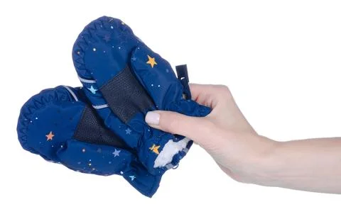 Children's ski gloves in hand Stock Photos