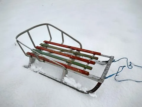 Children's sledge on the snow 스톡 사진