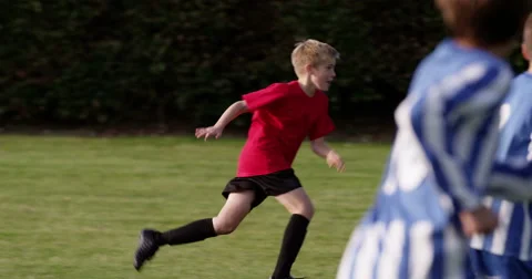 Children's soccer team on the field. Shot in slow motion on RED Epic. Stock Footage