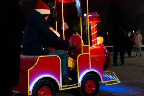 Children's steam train with neon lights in the dark Stock Photos