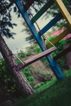 Children's swing on a chain 写真素材