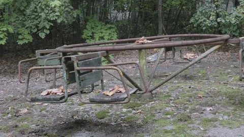 Children's swing in Chernogbyl Stock Footage 118525967