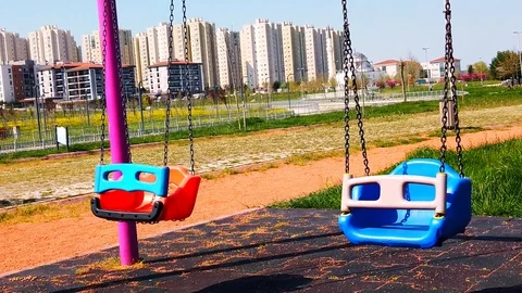 Children's swing, empty playground. Stock Footage 129898129