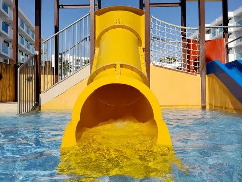 Children's swing in the pool Stock Photos