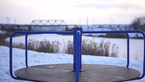 Children's swing by the river in winter Stock Footage 146779177