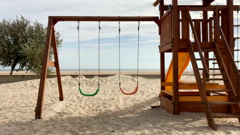 Children's swing by the sea 스톡 동영상 142225365