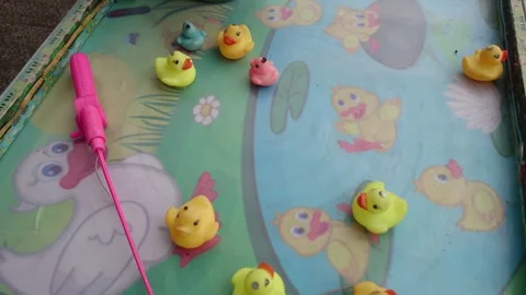 Children's toy in the form of a small duck that can spin itself Stock Footage 290100482