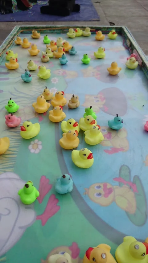 Children's toy in the form of a small duck that can spin itself Stock Footage 290100549