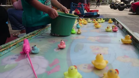 Children's toy in the form of a small duck that can spin itself 스톡 동영상 290100796