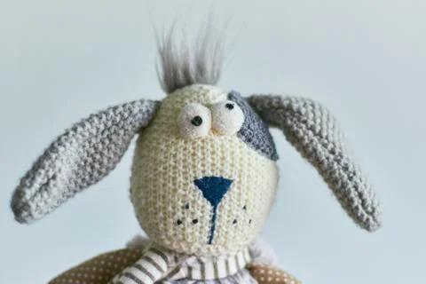 Children's toy plush rabbit isolated on a light background. head of a rabbit  Stock Photos