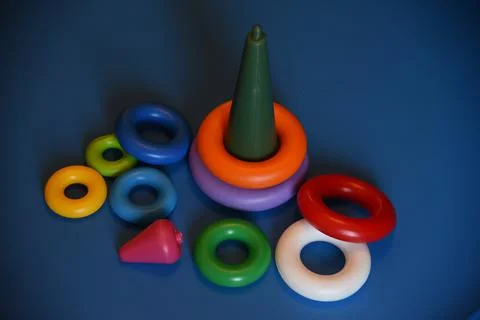 Children's toy pyramid, consisting of colored rings Stock Photos