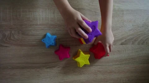 Children's toy pyramid, developing children's game for small children, brigh Stock Footage 153772679