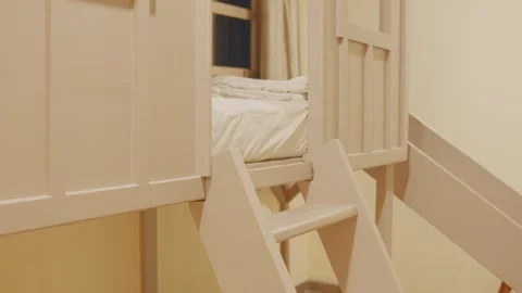 Children's White Bunk Bed with Stairs and Slide Stock Footage 276549526