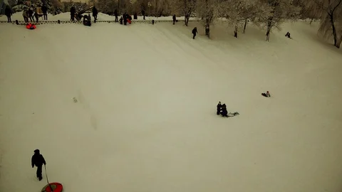 Children's winter fun on the hill Video stock 102268414