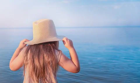 Child's back on the sea Stock Photos