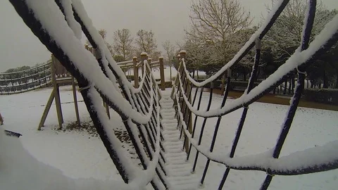 Child's bridge under the snowfall Stock Footage 103474326