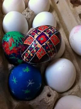 A Child's Easter Pysanka Resting on top of an Egg Carton Stock Photos