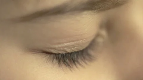 Child's eye brownish blinks Stock-Footage 76727895