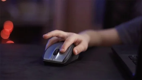 Child's hand with computer mouse Stock Footage 73555193
