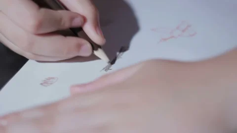 Child's Hand Drawing On The Sheet Stock Footage 93155153