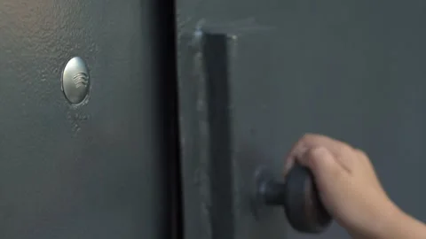 A childs hand opens a door using an electronic intercom key Video stock 284877841